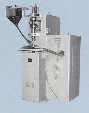 粉末成形機